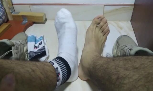 Sweat-Sopping white socks and nude feet after a long day