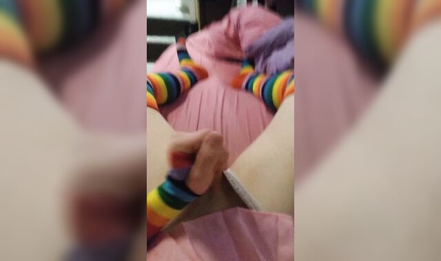 Weak femboy in pink college girl uniform and rainbow gloves & pantyhose blows a load