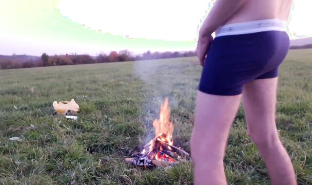 Boy wanks weekly jizm near campfire and tent