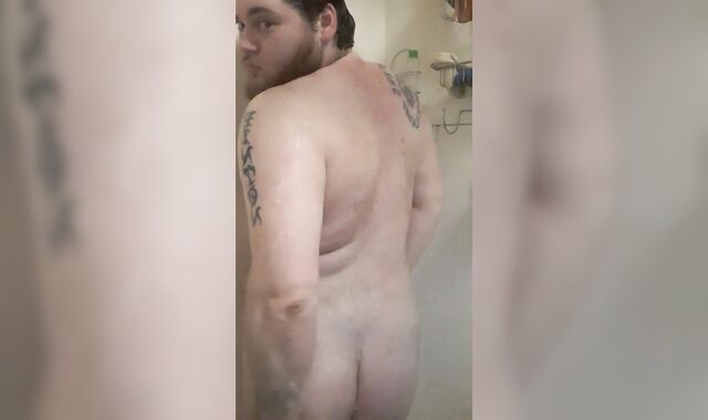 Bearded fellow with daddy body shower getting off
