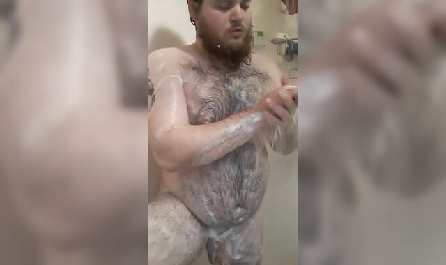 Bearded fellow with daddy body shower getting off