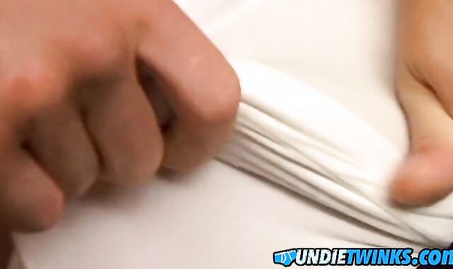 Youthfull jock Jeremiah Johnson crams his underwear with super-hot jizz