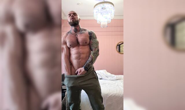 Inked cub flex muscle and stroke man sausage