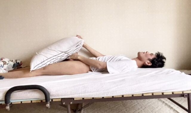 Perverted Asian boys touching their boners on the couch.