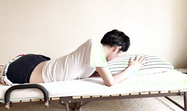 Perverted Asian boys touching their boners on the couch.