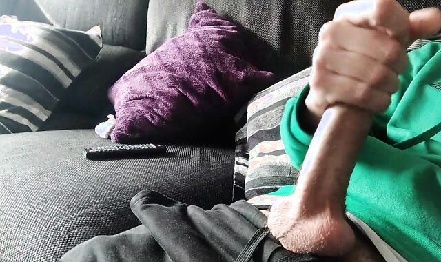 Massive Sinewy Schlong is Masturbated on the Couch Until He Blows A Load, we see a movie?