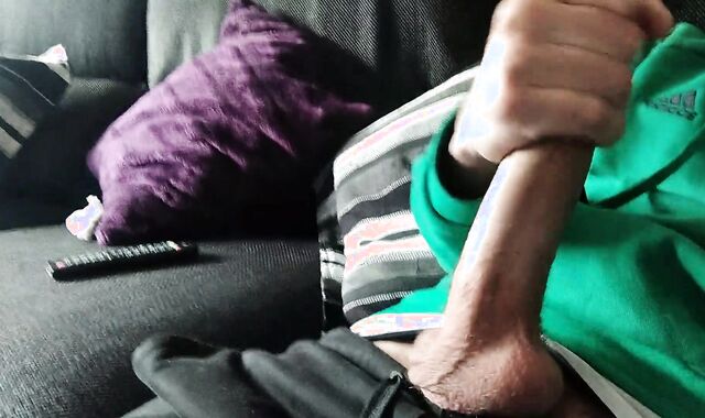 Massive Sinewy Schlong is Masturbated on the Couch Until He Blows A Load, we see a movie?