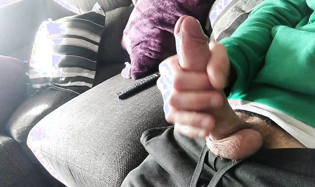 Massive Sinewy Schlong is Masturbated on the Couch Until He Blows A Load, we see a movie?