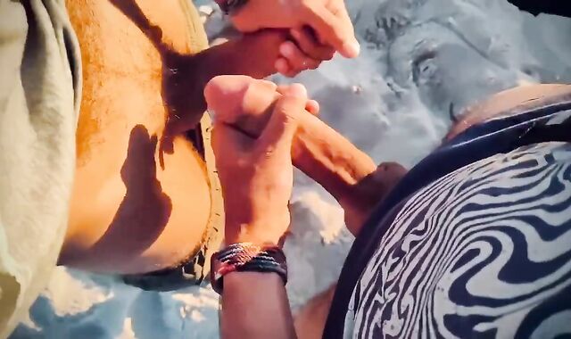 Sword Struggling penises with ample shoots a flow in a paradise beach at sunset