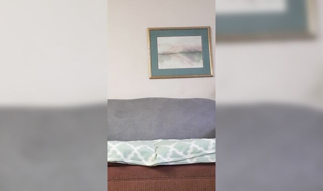 Buck demonstrating off and wanking on the couch