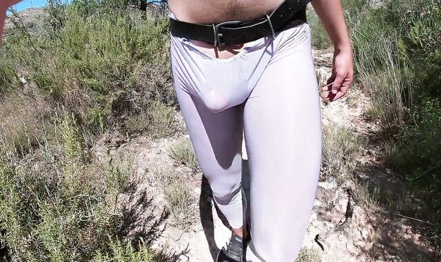 My tasty bone slowly getting rock stiff in see thru spandex stocking (public cock)