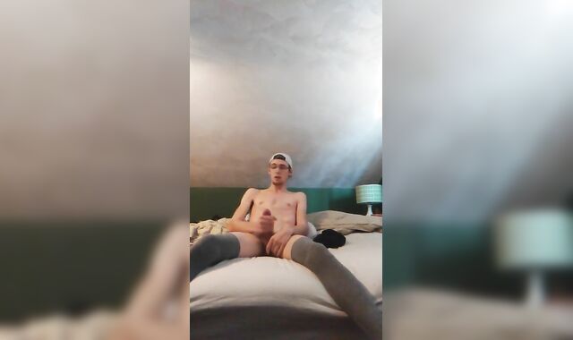 Tall Youngster frolicking with pound-stick and showing trunk-wringing rump