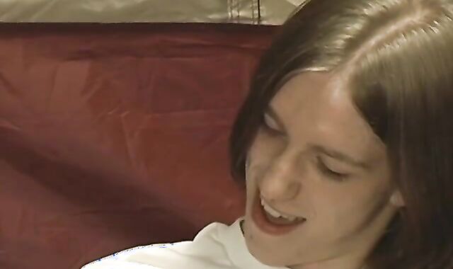 two skinny youthfull boys chat to each other before tugging