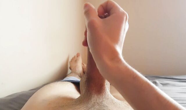 Teenager stroking his gigantic uncut man meat for explosive jizm shot