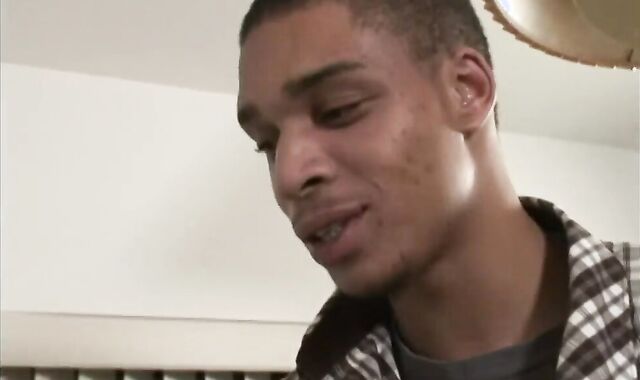 Long haired latino boy takes a black sausage up his arse