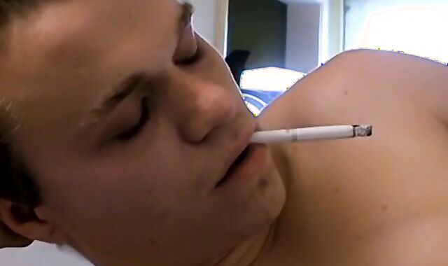 Twink cigar smoker jerks off until he bursts jizz on himself