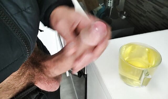 Ultra-Ultra-Kinky Pig Urinates in a Cup and then Masturbates off and Completes Off in the Piss