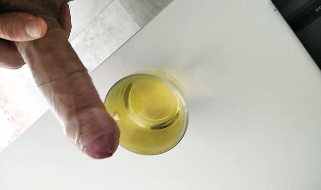 Ultra-Ultra-Kinky Pig Urinates in a Cup and then Masturbates off and Completes Off in the Piss