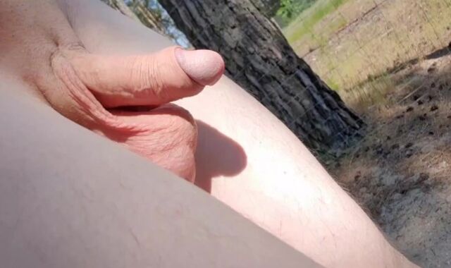 walking on the nudist beach with camera