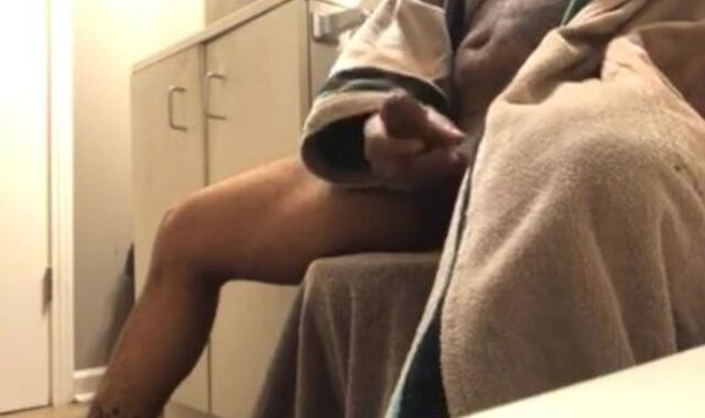 Milking off ample dark-hued boner before steaming bath