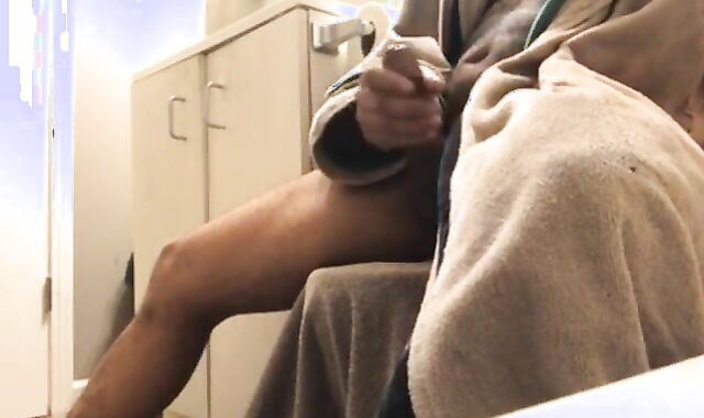 Milking off ample dark-hued boner before steaming bath