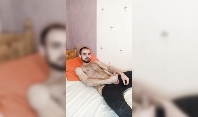 The fellow sates his puffies and goes over to rub his.