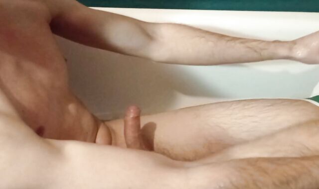 fellow jacks off erotically in the bathroom