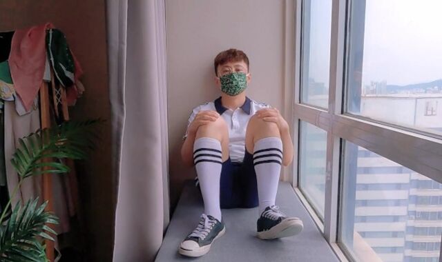 Guy in school uniform drains and blows a load by the window