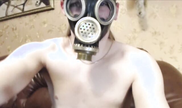 stud with gasmask, glorious garb and large cash-shot