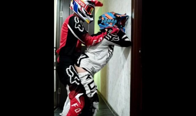 Motorcyclist pummels a stud in a motocross clothing and MXHelmet