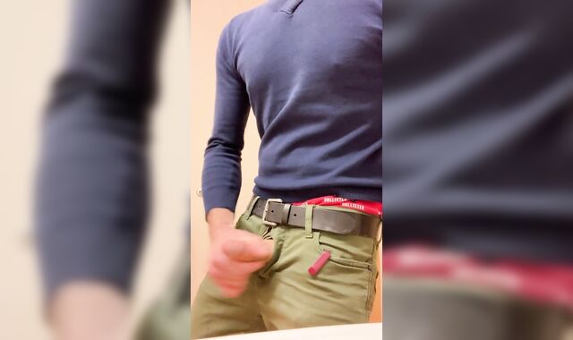 Stroking in a public bathroom in an office house before a docs tryst.