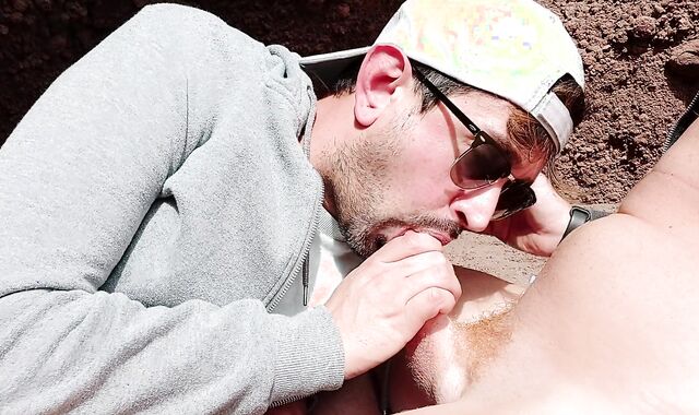 Deep Sucking my red husband on the beach