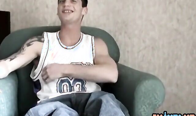 Abnormal lad displays his naked feet and tugs pecker solo