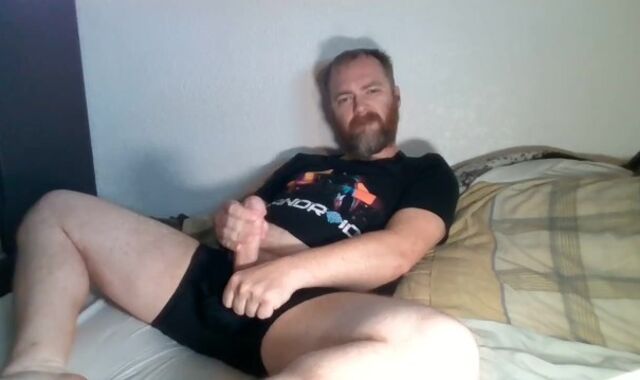 Scruffy fellow jerks off to porn, snuffles underwear, & eats his own geyser