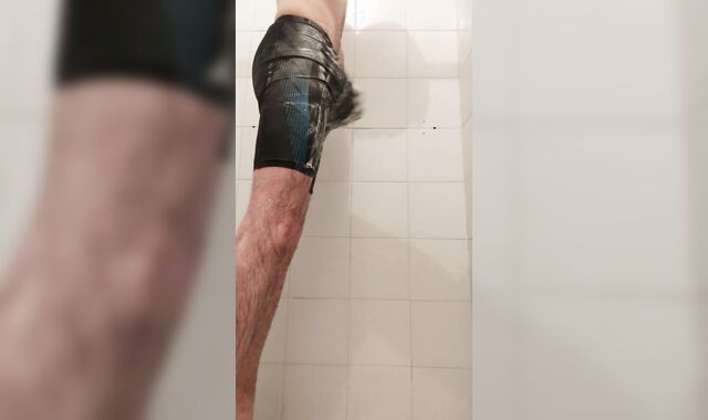 Speedo Fellow gets naughty in the bathroom