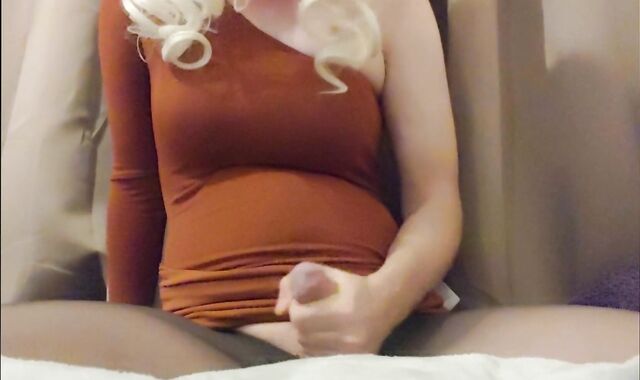 crossdresser drains and blows a blast clad in one sleeve dress