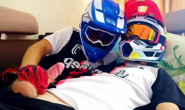 two fellows in helmets jack off and jizz