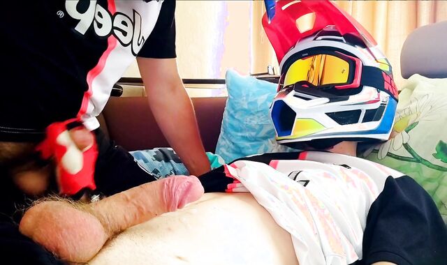 two fellows in helmets jack off and jizz
