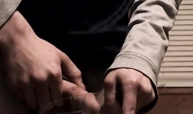 Solo youthful dude urinates in a glass before making his trouser snake jizm