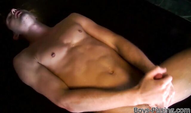 Athletic young JD Phoenix pisses and blows a blast on himself solo