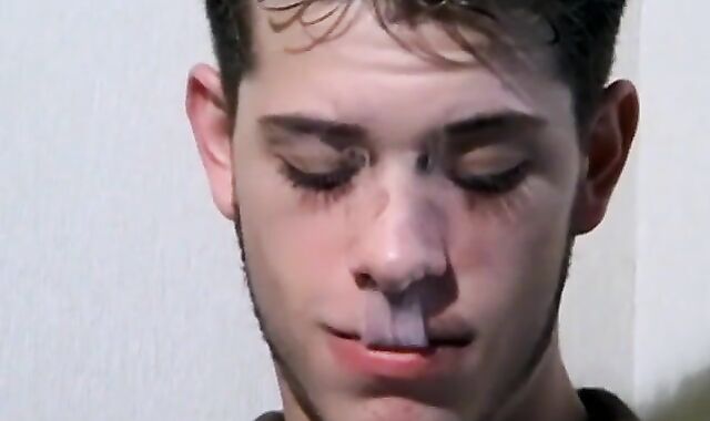 Nice twink smoker busts jizz before finishing ciggy