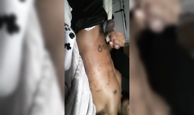 Busting enormous testicles in shorts while everyone in bed