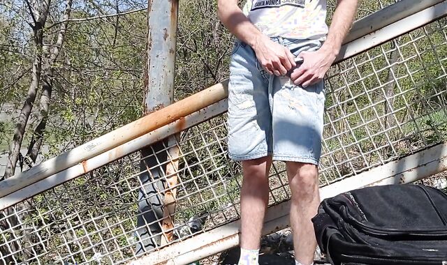 The guy drains off and blows a load in the stadium in extreme