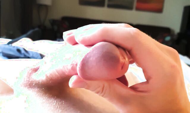 Up close on a meaty pulsing spunk-shotgun head, in light of hotel window