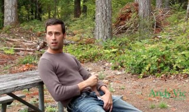 Jizzing in a park along a road with traffic