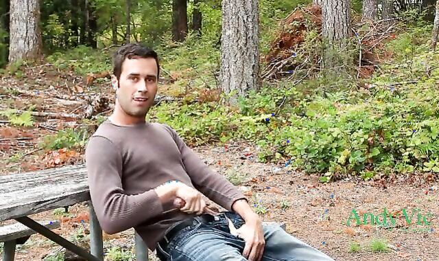 Jizzing in a park along a road with traffic