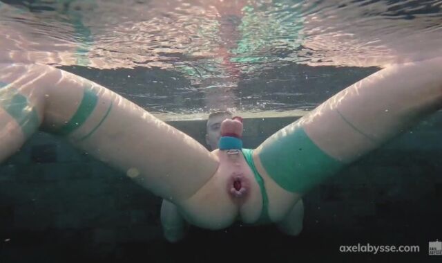 Axel Abysse fists his vagina by the pool