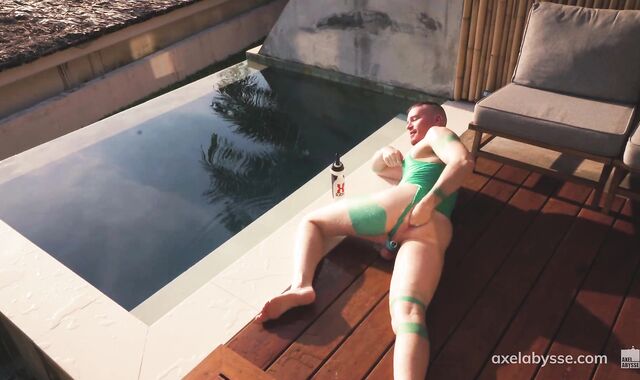 Axel Abysse fists his vagina by the pool