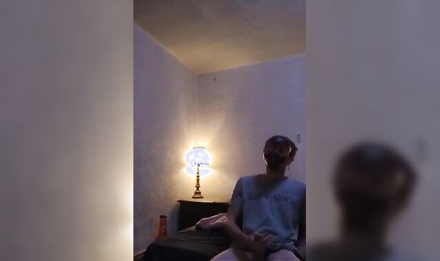 Strung Up lad urinates and strokes off!