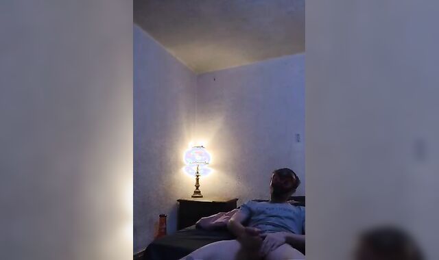 Strung Up lad urinates and strokes off!